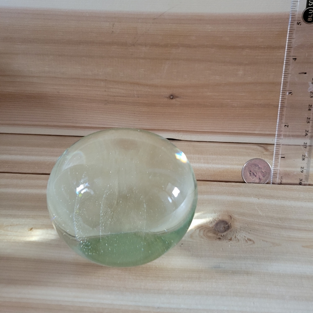 Hand-blown paper weight.